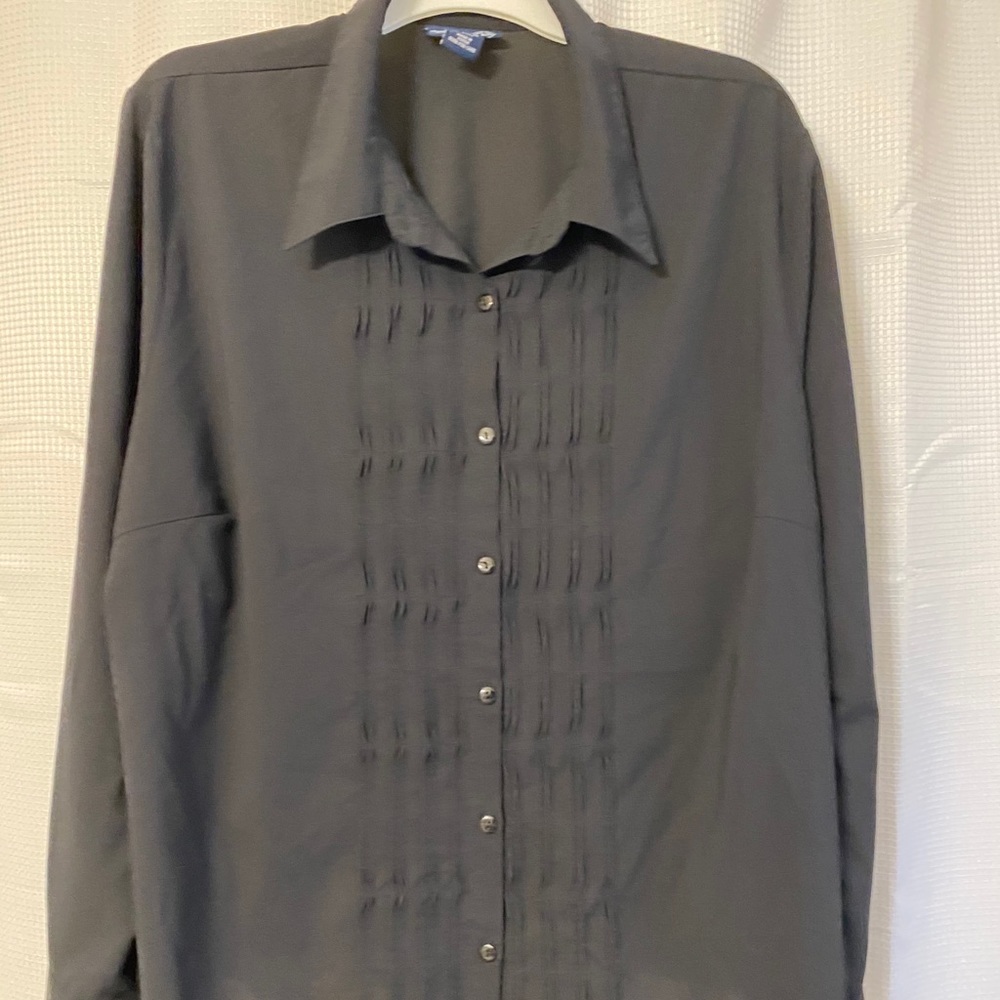Black top with pleat front. Great condition.